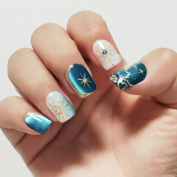 Close-up of 3D handmade blue celestial cat eye fake nails