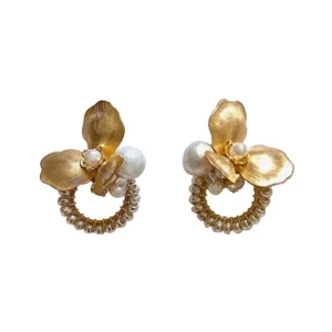 Vintage-inspired brass earrings with floral motifs and Japanese cotton pearls