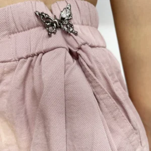 butterfly Waist Adjuster Clips for Dresses Pants Jeans Sleeves Too Big Loose detail showing dual pin posts and metal backing discs gunmetal finish